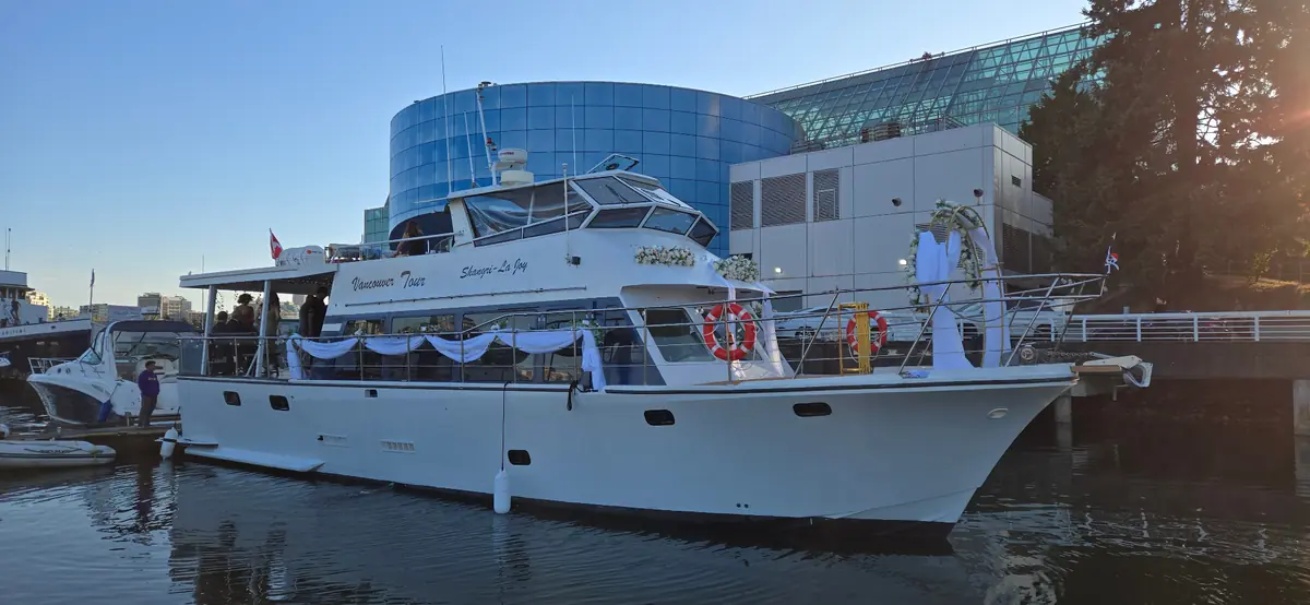 Joy yacht docked and decorated for a wedding