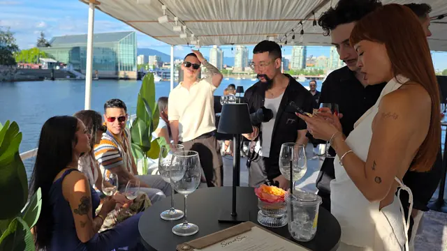 Cocktail hour on deck with Vancouver skyline